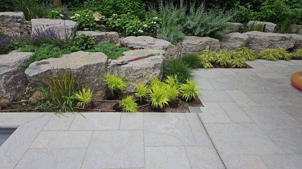 Rock garden and flagstone patio built by ISR Gardening in Richmond Hill